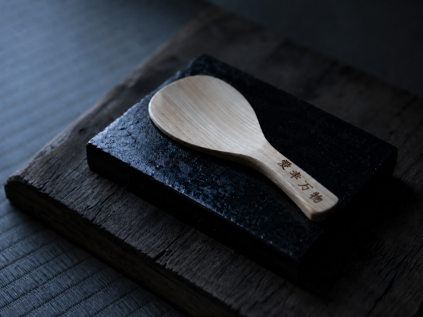 Hinoki shamoji on stone